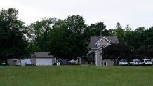 The home of shooting suspect Vance Boelter is seen Sunday, June 15, 2025, in Green Isle, Minn. (AP Photo/George Walker IV)